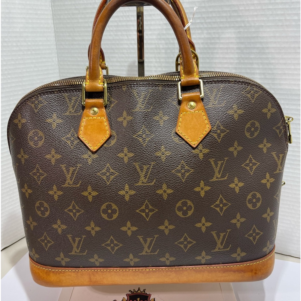 Louis Vuitton Alma with D ring in Monogram  comes with dust bag